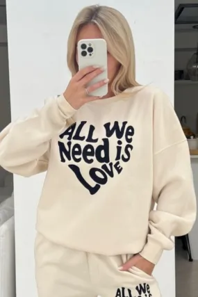 All we need is love ecru embroidered sweater