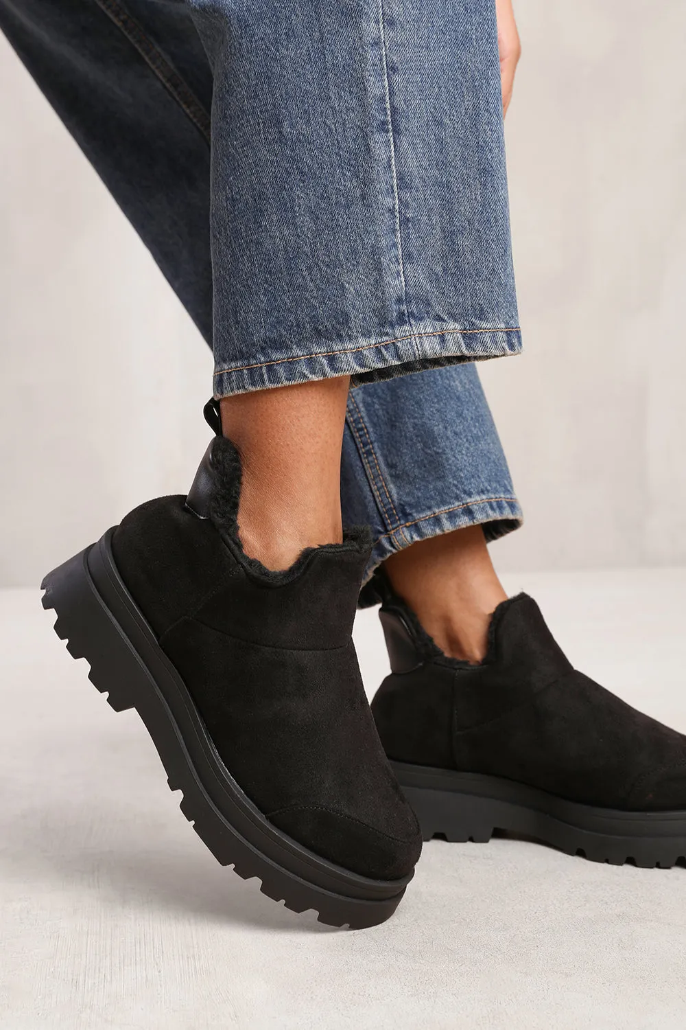 NANCIE LOW ANKLE BOOT WITH FAUX FUR LINING AND CHUNKY SOLES IN BLACK SUEDE