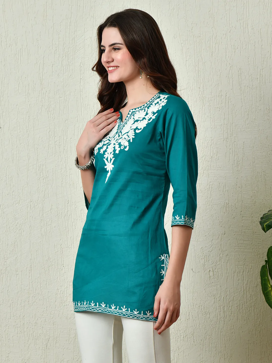 Women Stylish Turquoise Cotton Short Kurti With Elegant Work