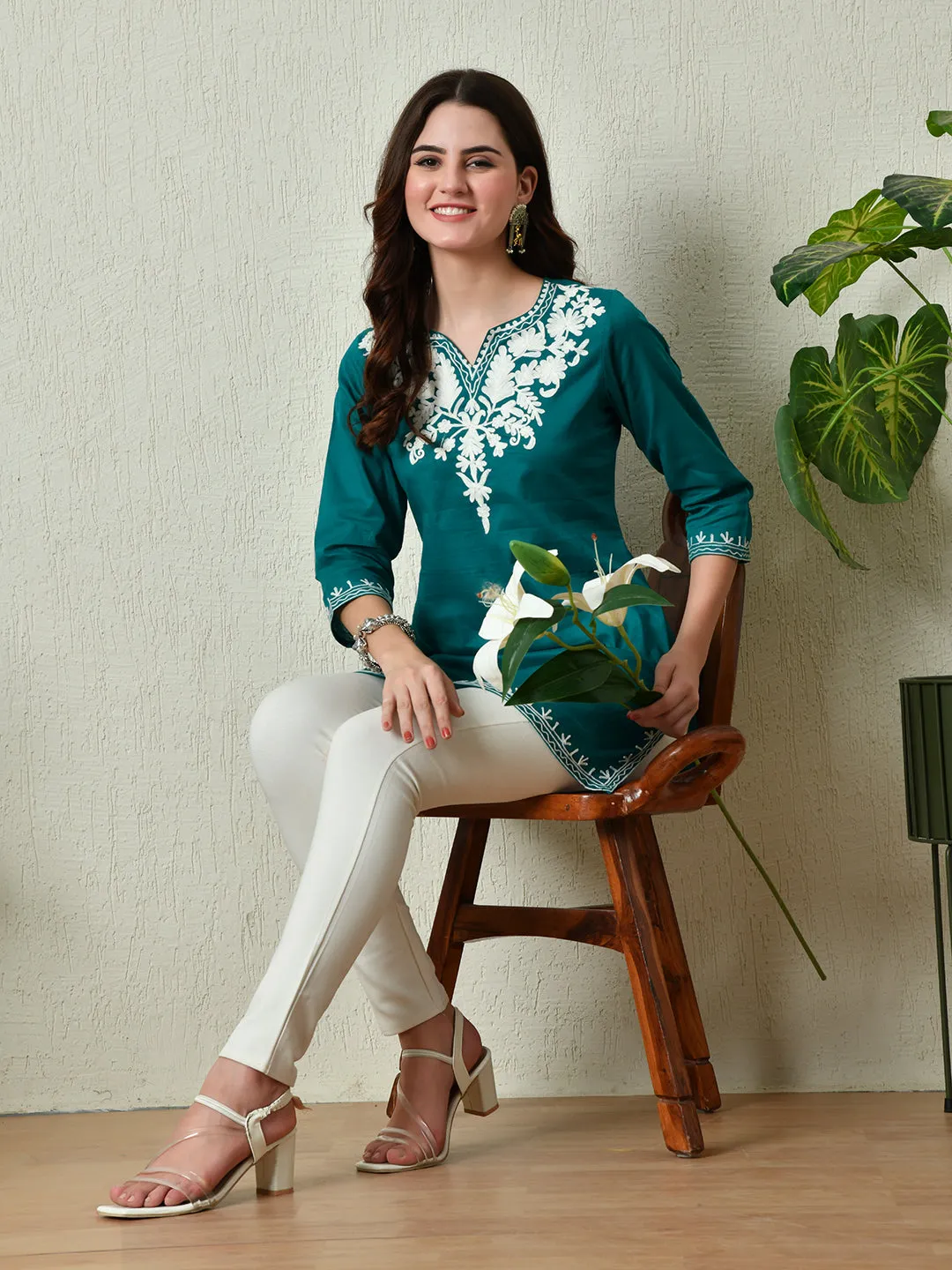 Women Stylish Turquoise Cotton Short Kurti With Elegant Work