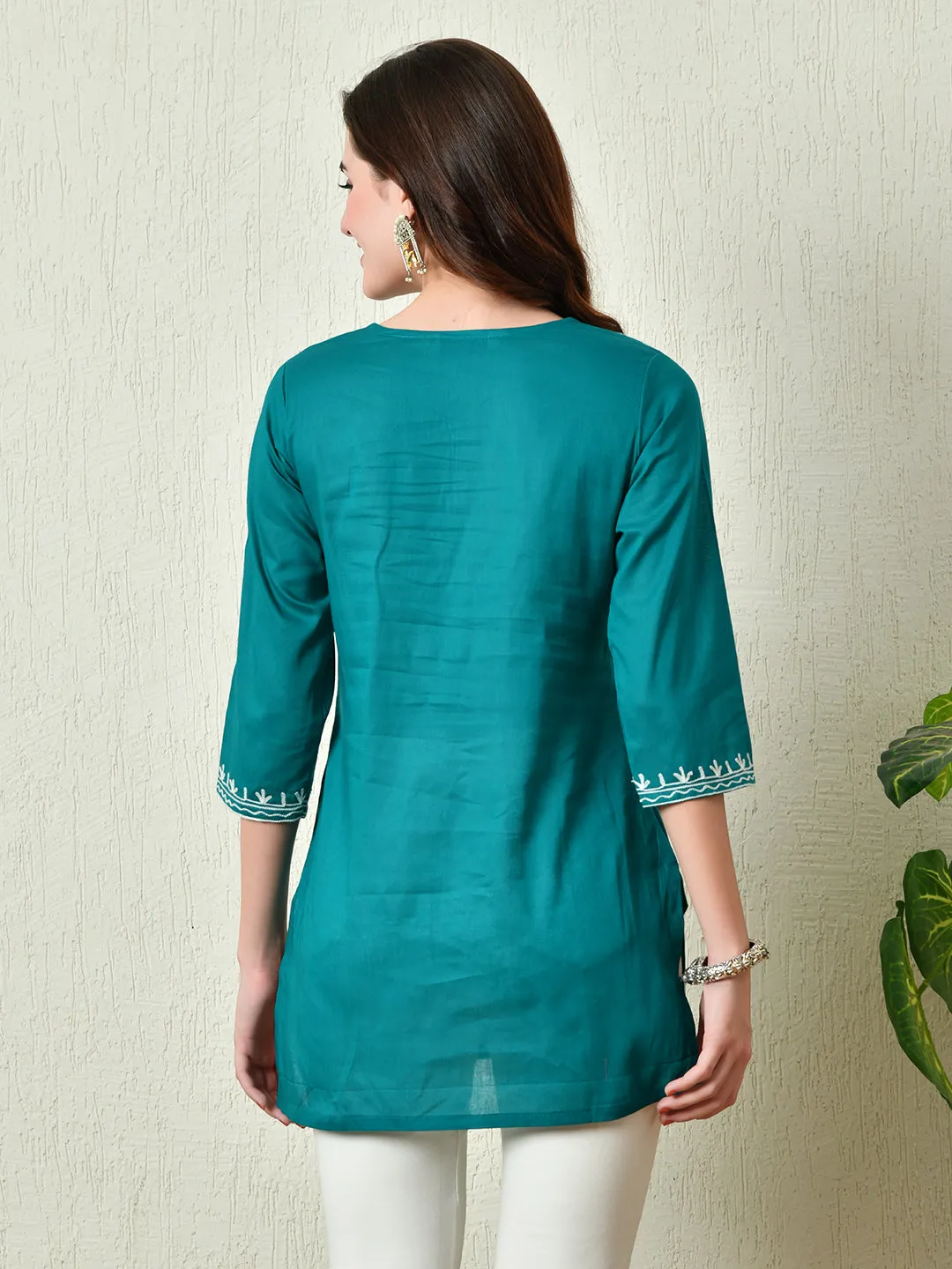 Women Stylish Turquoise Cotton Short Kurti With Elegant Work